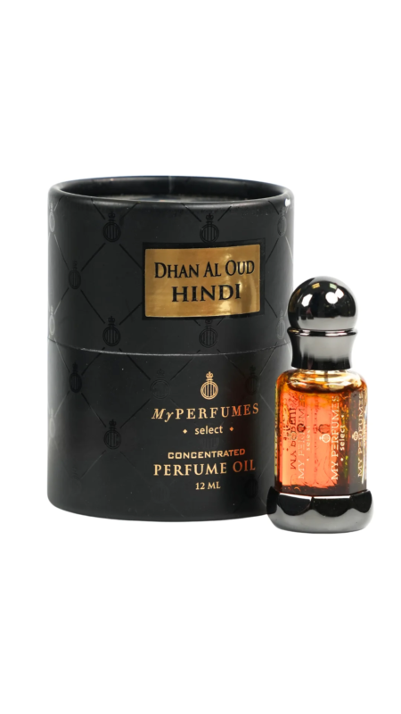 Un flacon d'huile parfumée Musk Dhan Al Oud Hindi My Perfumes (12 ml) à côté de son emballage cylindrique noir aux accents dorés, dégageant une ambiance de sophistication Mode Grande Taille. Mode Grande taille