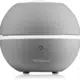 Le Diffuseur ultrasonique-Dove Millefiori est un diffuseur rond gris doté d'un bouton d'alimentation et d'une bande blanche autour de son milieu. Mode Grande taille