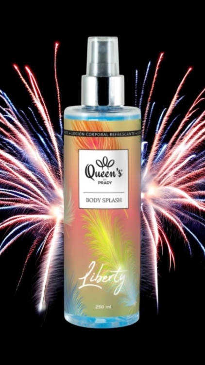 Une bouteille de Brume Liberty Body Splash avec des feux d'artifice colorés en arrière-plan. Mode Grande taille