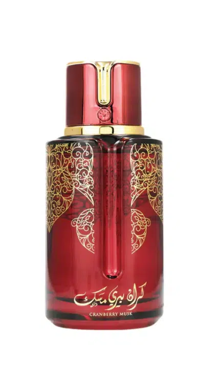 Flacon de parfum bleu avec motifs décoratifs dorés et écriture arabe, étiqueté "Parfum Musk Blueberry". Mode Grande taille