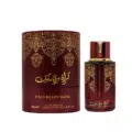 Flacon de parfum bleu et boîte assortie à motifs dorés, comportant du texte arabe et anglais, étiqueté Parfum Musk Blueberry. Mode Grande taille