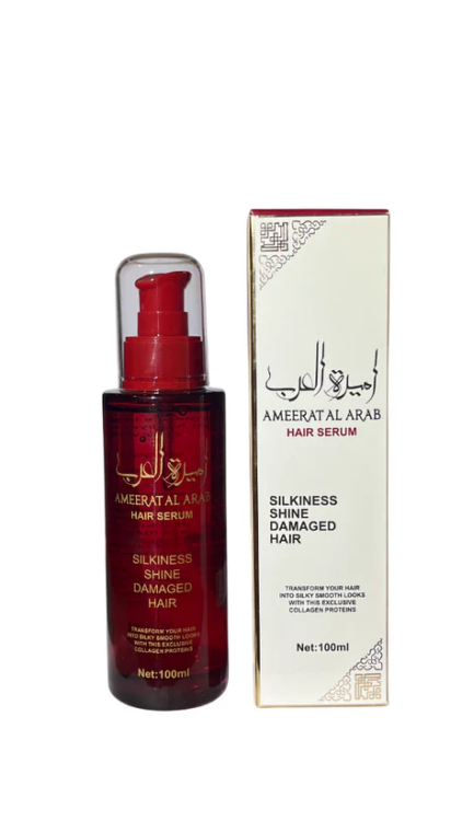 Un flacon rouge de 100 ml de Sérum cheveux parfumé - Ameerat Al Arab est placé à côté de sa boîte d'emballage blanche assortie de 100 ml. Mode Grande taille