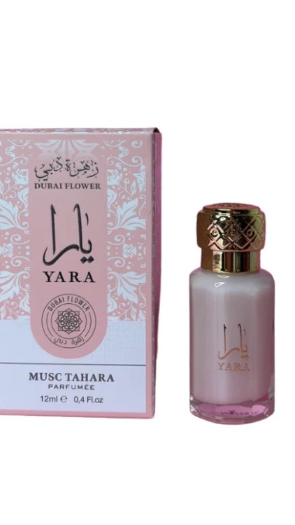 Une boîte rose et un flacon de parfum Musc Tahara Yara, 12ml, par Dubai Flower. Mode Grande taille