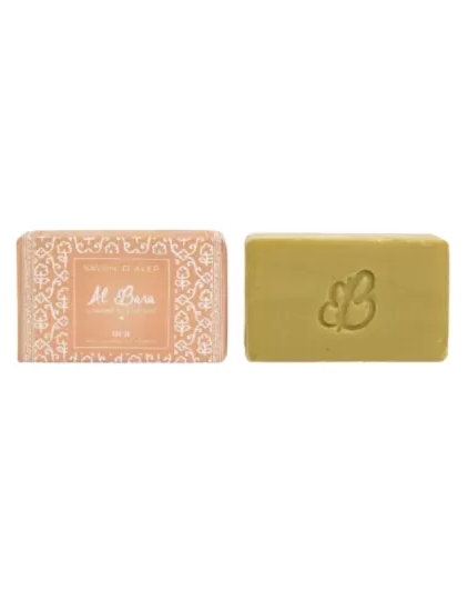 Deux tablettes Savon d'Alep Parfumé 100g Oud - Al Bara de couleur vert olive : l'une dans un emballage décoratif rose, l'autre estampillée du logo "B". Mode Grande taille