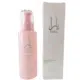 Un flacon de Sérum cheveux Yara Rose avec une boîte rose assortie, étiqueté pour la douceur et la brillance des cheveux abîmés. Mode Grande taille