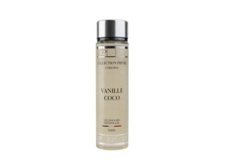 Un flacon transparent de Gel Douche Vanille Coco - Collection Privée avec un bouchon argenté et une étiquette minimaliste. Mode Grande taille