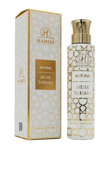 Un flacon et un coffret d'Eau de Milky Musk Tahara by Hamidi, 100ml, avec des motifs dorés et blancs. Mode Grande taille