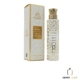 Un flacon et un coffret d'Eau de Milky Musk Tahara by Hamidi, 100ml, avec des motifs dorés et blancs. Mode Grande taille