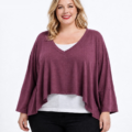 Pull court asymétrique en maille douce grande taille, col V, manches chauve-souris et pointes latérales